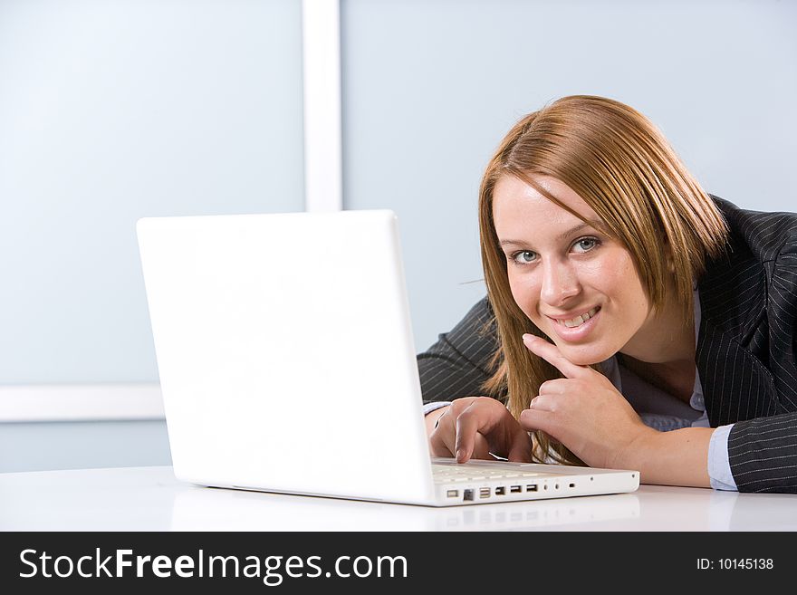 Business woman laptop in modern office