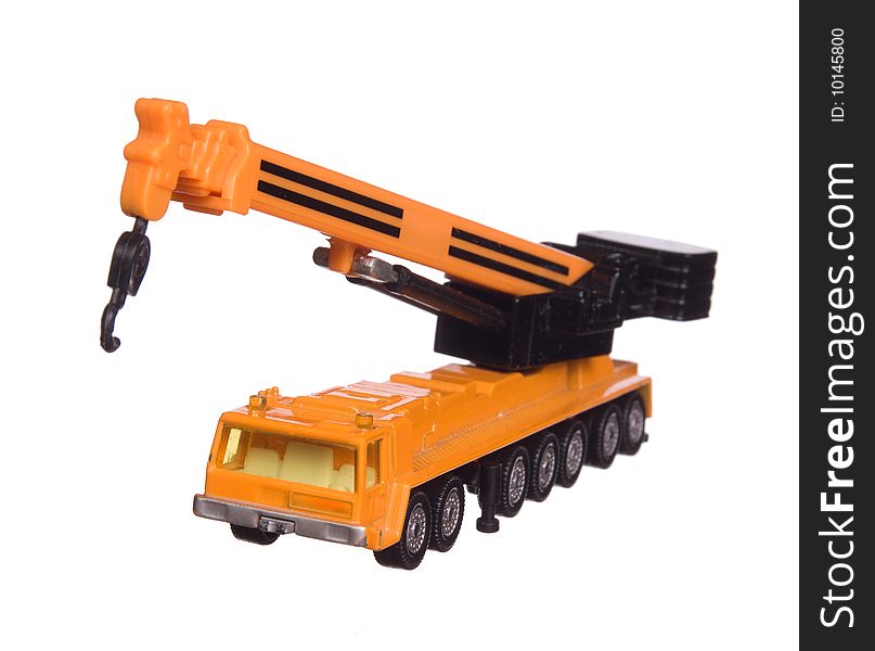 The toy - orange building machine. The toy - orange building machine