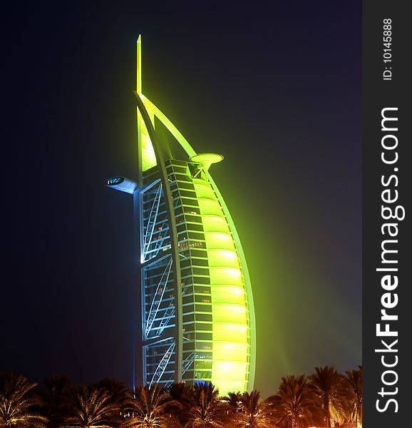Burj Al Arab glowing at night in Green