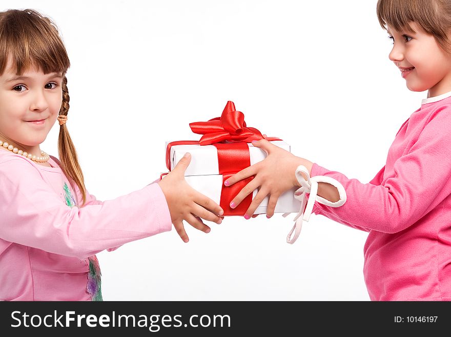 Little girls holding white gift boxes. Little girls holding white gift boxes