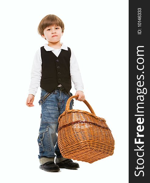 Handsome little boy holding basket, isolated on white