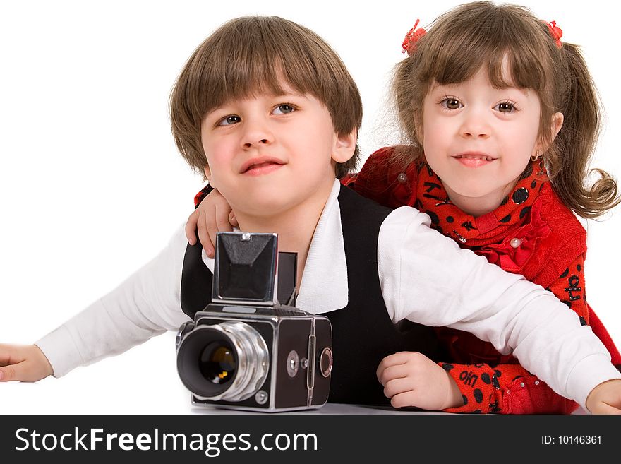 Adorable children taking pictures with photo camera. Adorable children taking pictures with photo camera