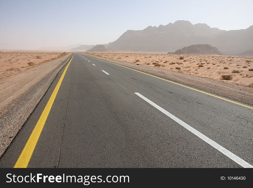 street in the desert of Wadi Rum, Shows the lines of the street, and the vanishing point of street perspective. street in the desert of Wadi Rum, Shows the lines of the street, and the vanishing point of street perspective
