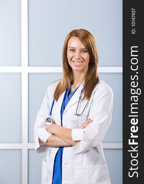 Female doctor arms crossed in a modern office