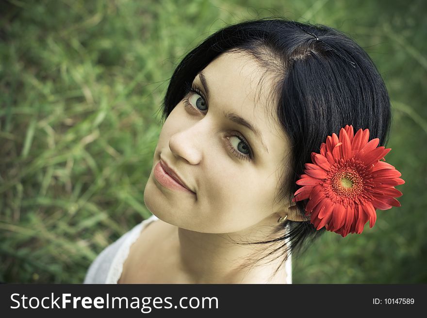 Portrait of beauty girl on meadow