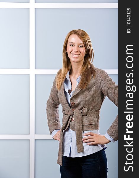 Business woman in modern office hand on hip