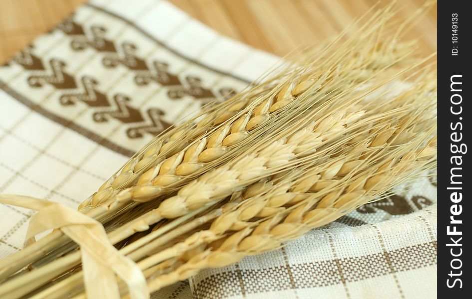 Gold wheat harvest on a kitchen towel