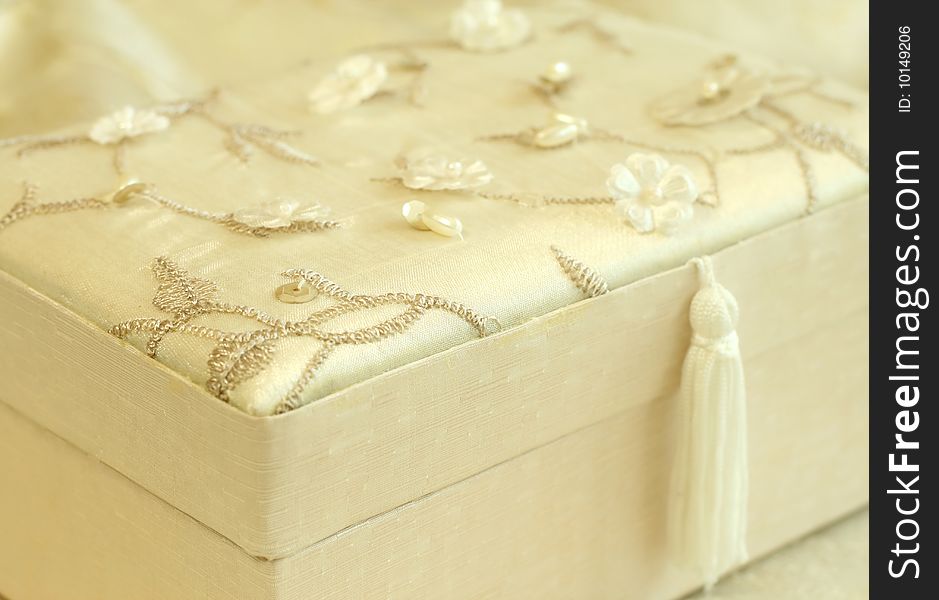 Beautiful gift box sheathed by silk with an embroidery. Best for theme: christmas, birthday, celebration, anniversary