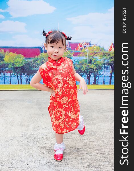 Girl in traditional chinese costume with funny face