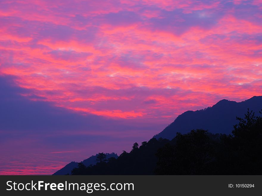 Chinese Guangdong first peak rosy-colored clouds at dawn. Chinese Guangdong first peak rosy-colored clouds at dawn.