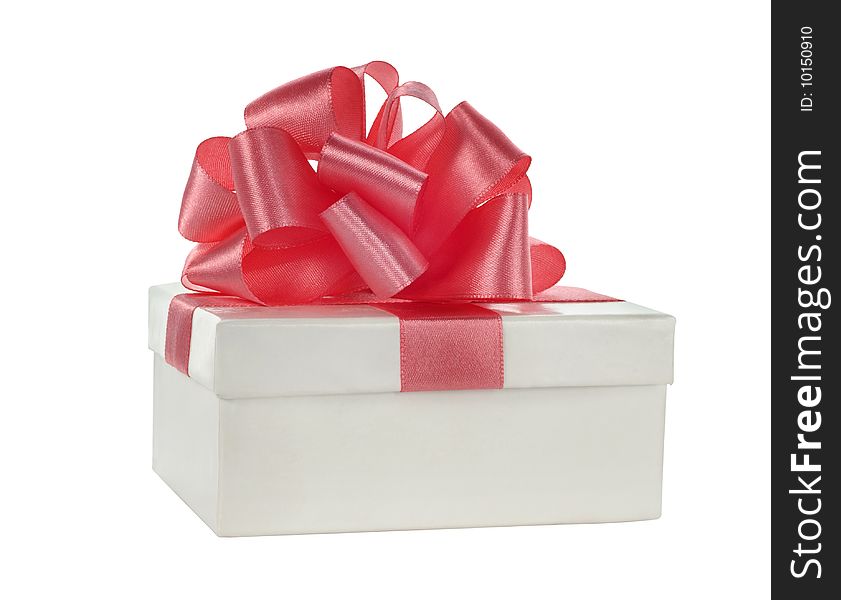 White box with pink satin ribbon bow on white background. White box with pink satin ribbon bow on white background