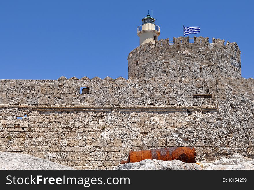 Lighthouse at harbour in Rhodes, Greece