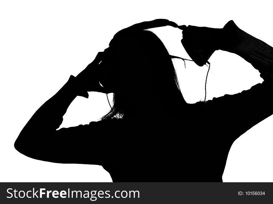 Woman listening loud music over white background wearing green t-shirt