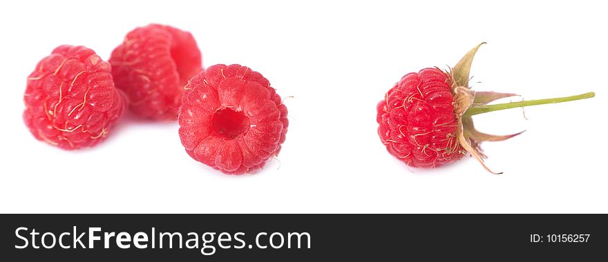 Red ripe raspberry on white background