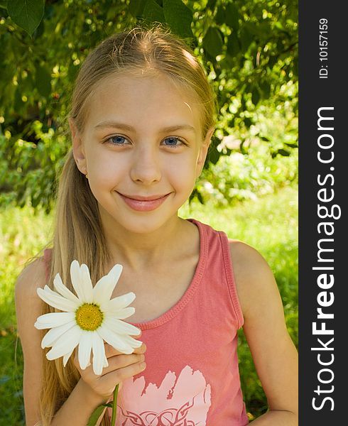 Smiling girl teenager with flower. Smiling girl teenager with flower