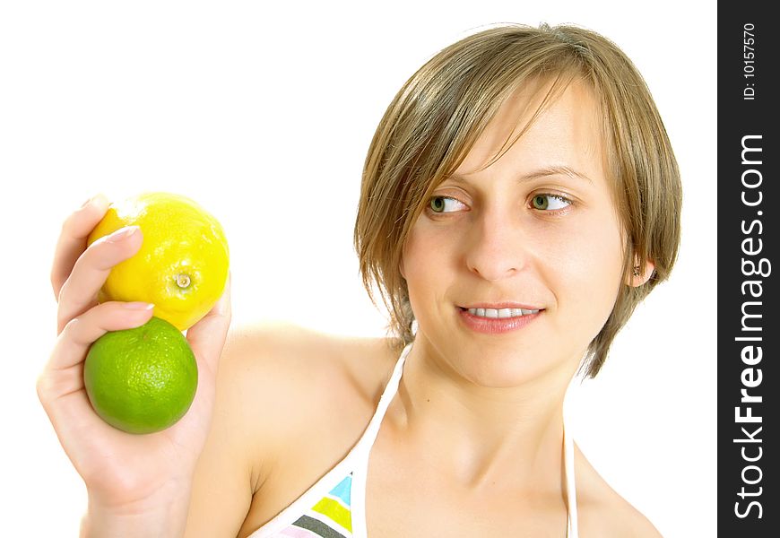 Cute Girl Showing Citrus Fruits