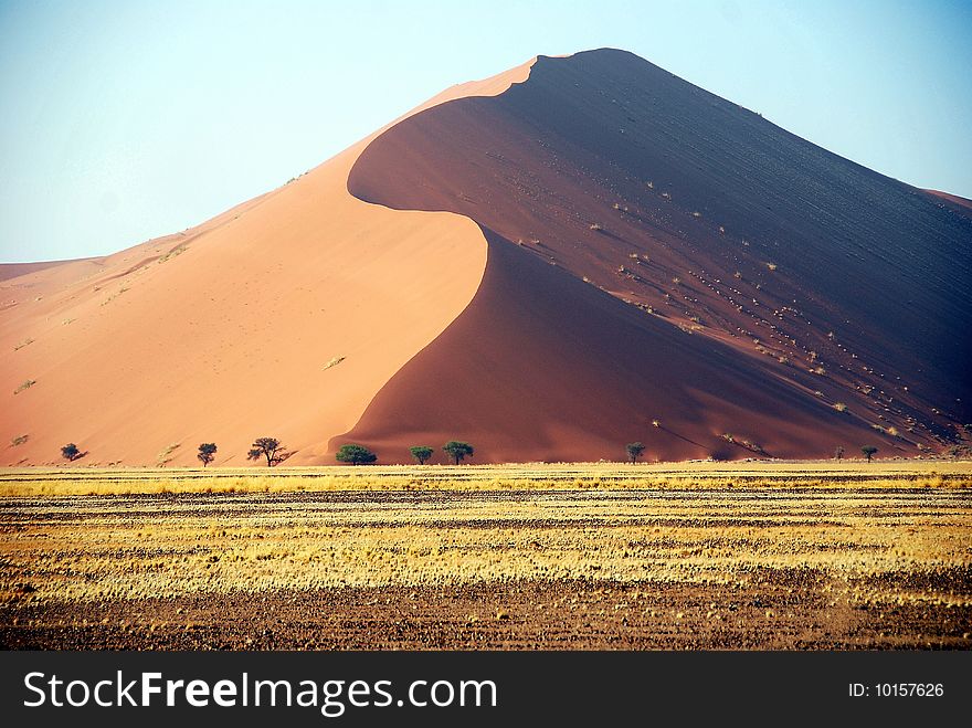 Dunes in Sossusvlei in the Namib Desert, Namibia. Dunes in Sossusvlei in the Namib Desert, Namibia
