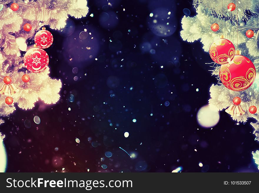 Christmas background with snow covered fir tree branches with holiday decorations. Christmas background with snow covered fir tree branches with holiday decorations.