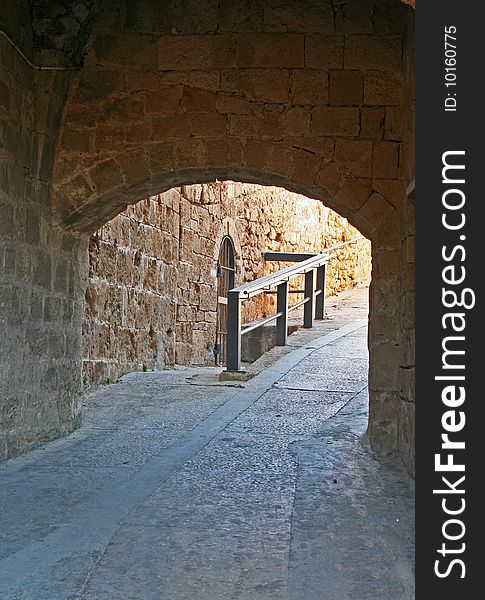 An ancient arch in the old city of Jerusalem. An ancient arch in the old city of Jerusalem