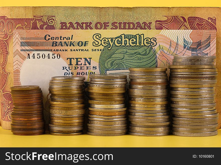 Foreign currency notes and coins with selective focus