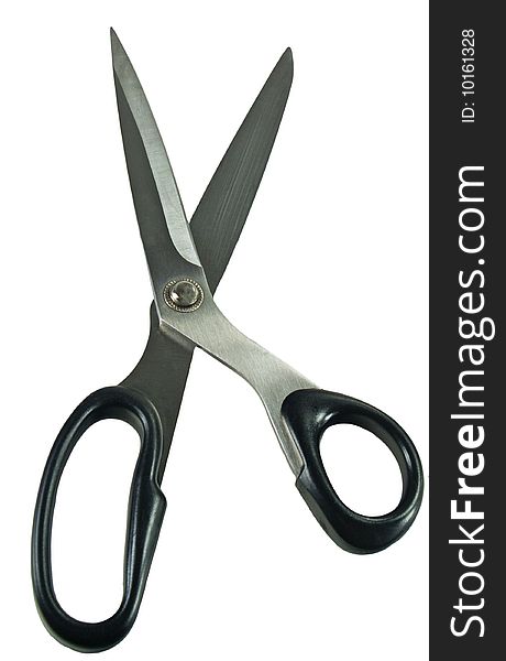 A pair of stainless steel scissors with black handles, open, isolated on white. A pair of stainless steel scissors with black handles, open, isolated on white