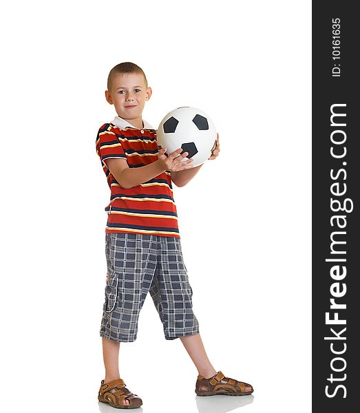 Young boy holding football in his hand. Young boy holding football in his hand