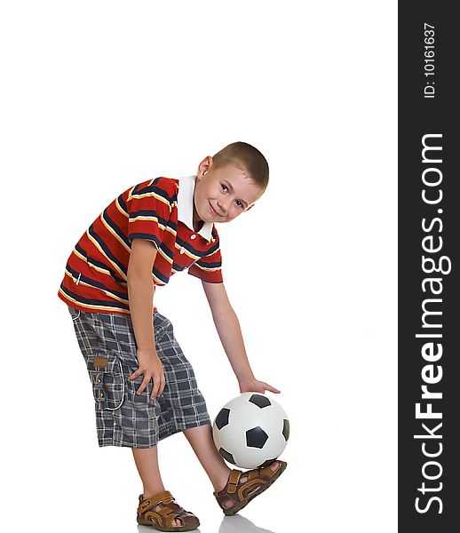 Young boy holding football in his hand. Young boy holding football in his hand