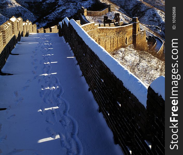 The Great Wall in winter, covered with snow.