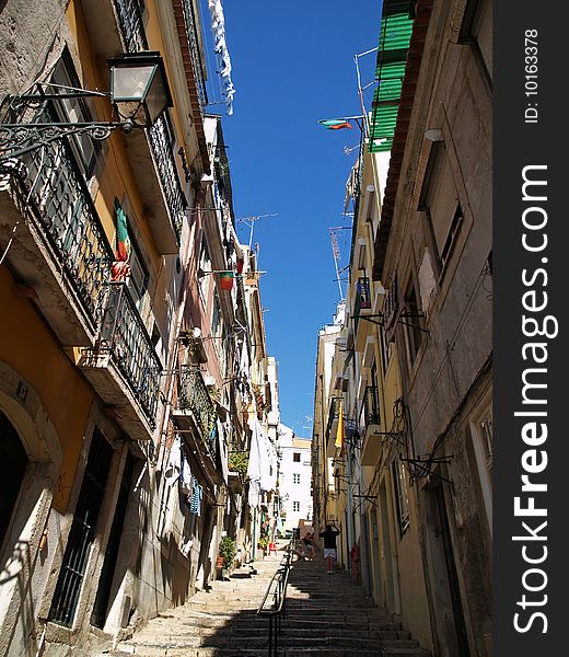 One of lisbon's narrow and steep streets. One of lisbon's narrow and steep streets