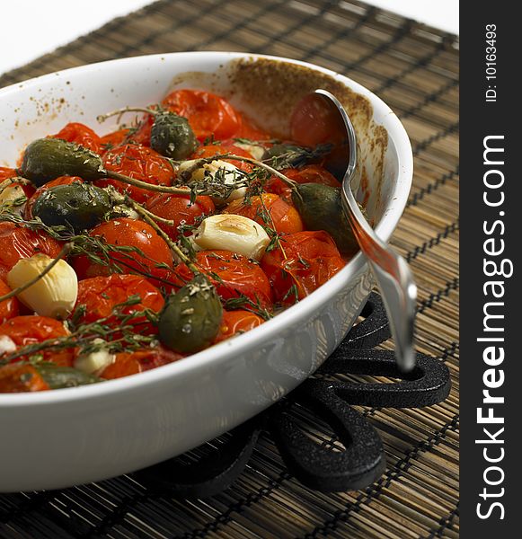 Warm tomato salad with capers