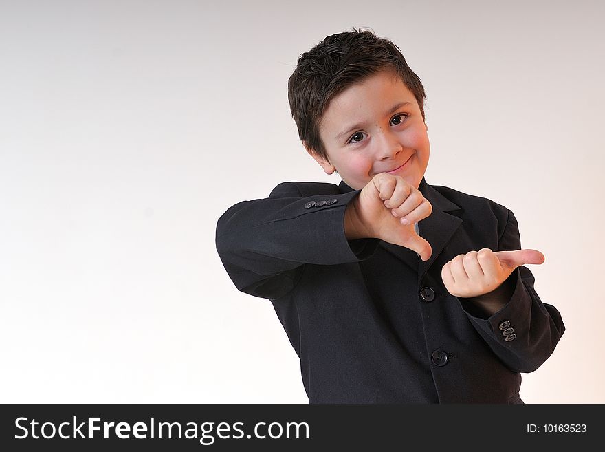 Elegant boy with brown jacket in studio. Elegant boy with brown jacket in studio