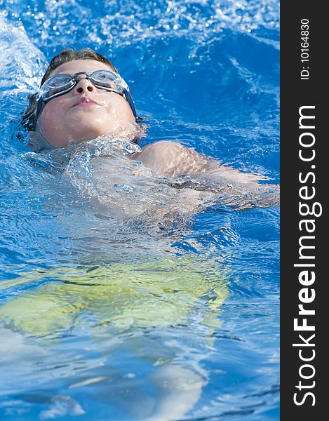 Picture of a boy on a swimming pool