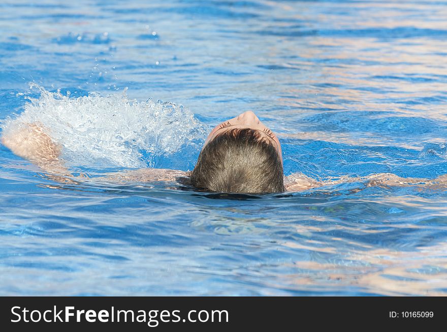 Picture of a boy on a swimming pool