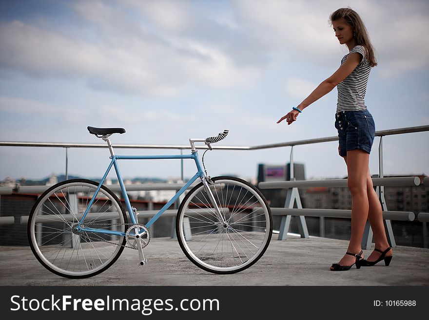 A Girl With Blue Bike