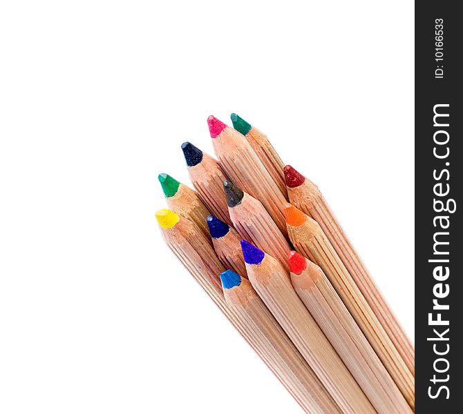 Colored pencils isolated over white background