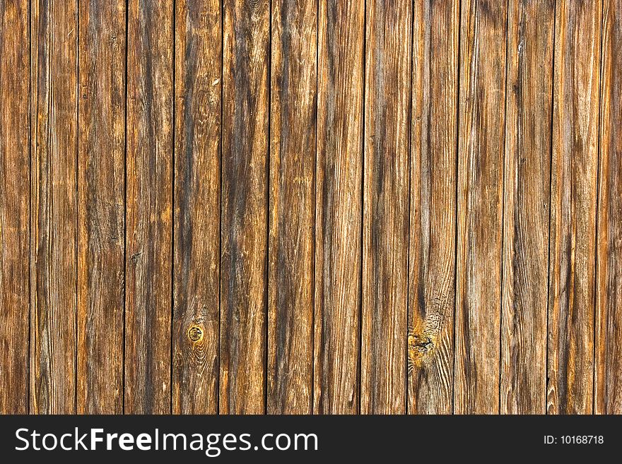 Dirty, stained by a paint the hammered together fence. Dirty, stained by a paint the hammered together fence