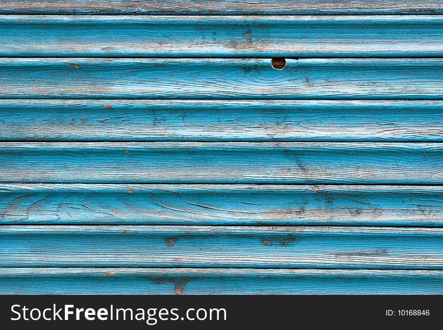 Dirty, stained by a paint the hammered together fence. Dirty, stained by a paint the hammered together fence