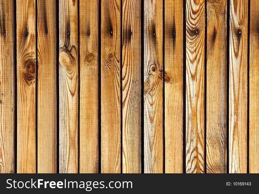 Dirty, stained by a paint the hammered together fence. Dirty, stained by a paint the hammered together fence