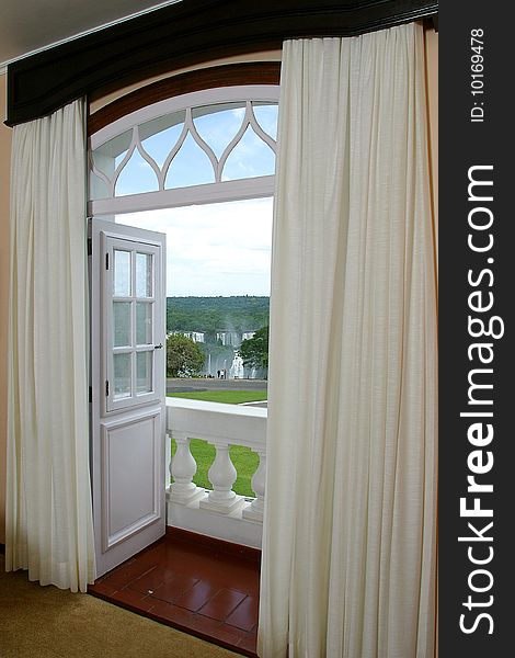 View of iguazu falls through hotel windows in brazil. View of iguazu falls through hotel windows in brazil