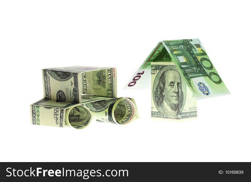 The car and the house made of Dollars and euro isolated on white background