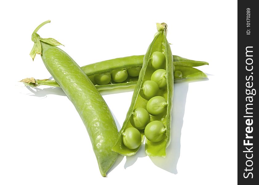 Three open pea pods isolaned on white. Three open pea pods isolaned on white