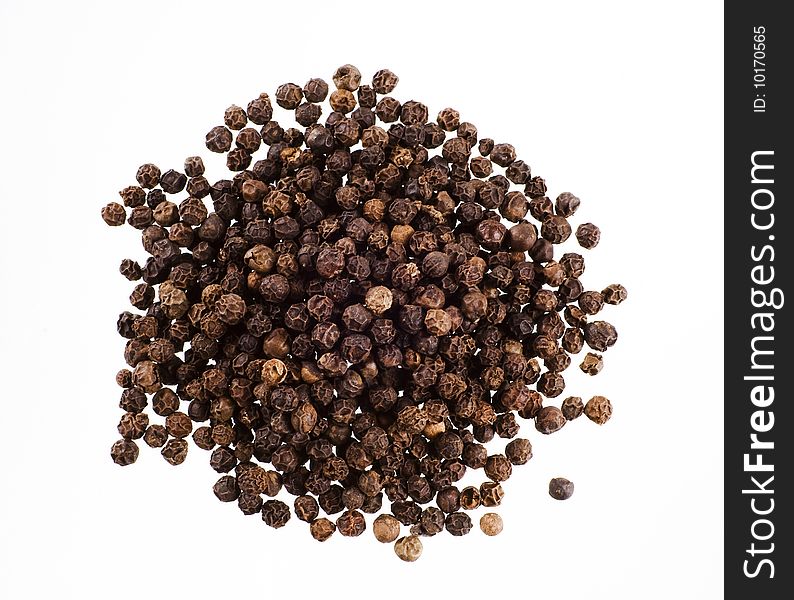 Heap of black peppercorns - studio shot