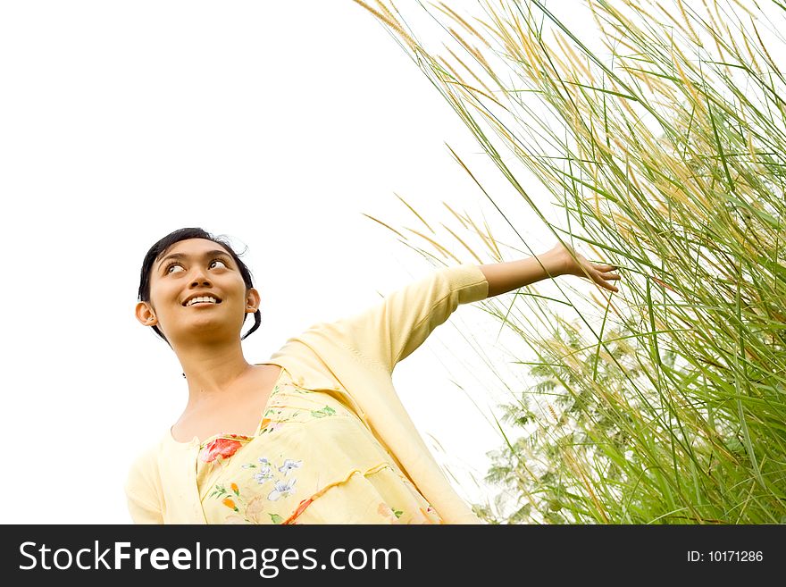 Lifestyle concept of a beautiful asian young woman enjoying a beautiful day outdoor. Lifestyle concept of a beautiful asian young woman enjoying a beautiful day outdoor