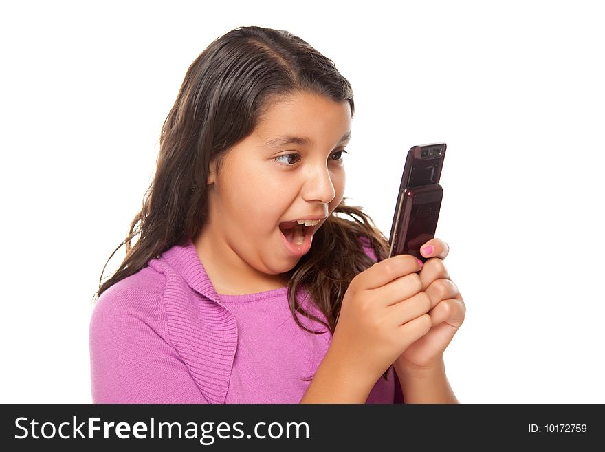 Shocked Pretty Hispanic Girl On Cell Phone Isolated on a White Background.