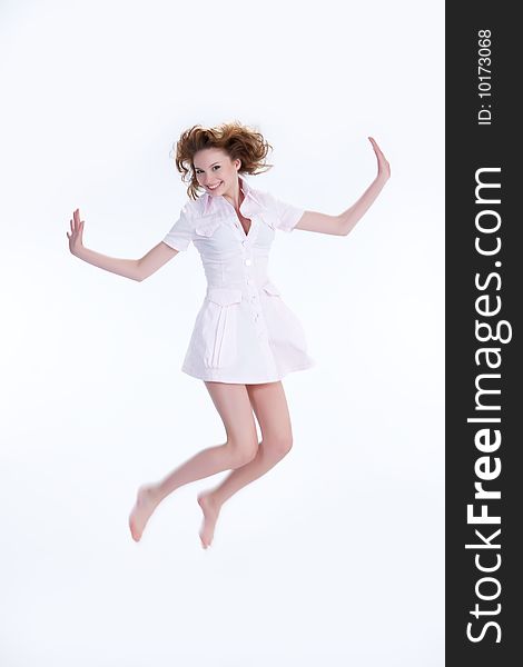 Young woman jumping and laughing