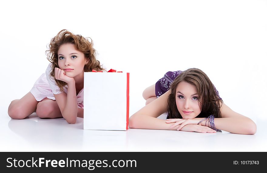 Young women on isolated background thinking. Young women on isolated background thinking