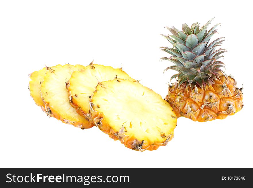 Pineapple segments on a white background, it is isolated.