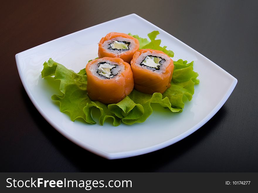 Photo of a rolled and sushi