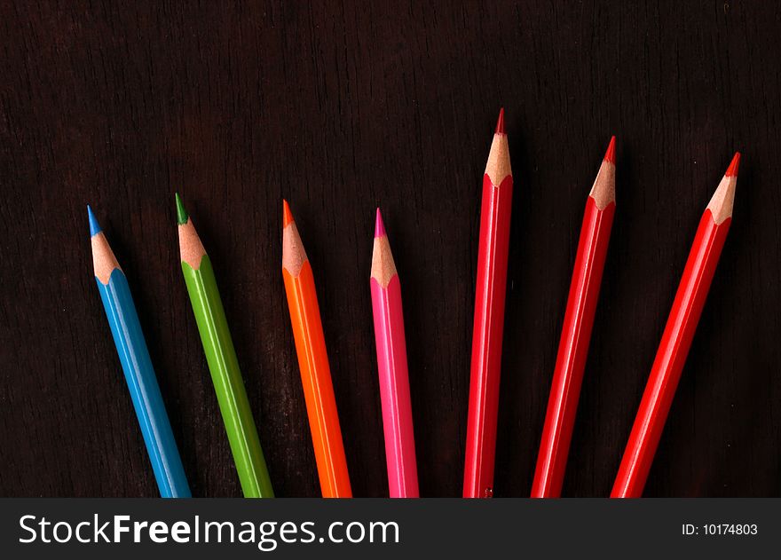 Multicolored pencils with handmade paper