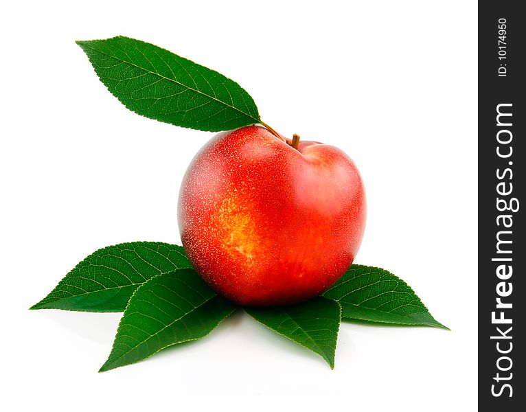 Ripe Peach (Nectarine) with Green Leafs Isolated